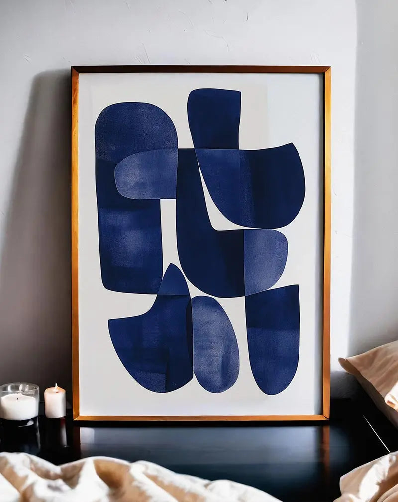 A modern abstract illustration featuring overlapping blue shapes on a light background. Perfect wall art for creating a minimalist and artistic atmosphere in any space