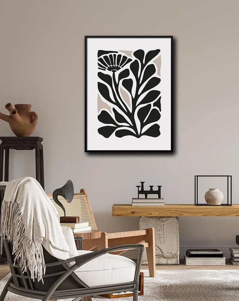 Minimalist black botanical illustration featuring bold floral and leaf designs, perfect for modern and nature-inspired decor