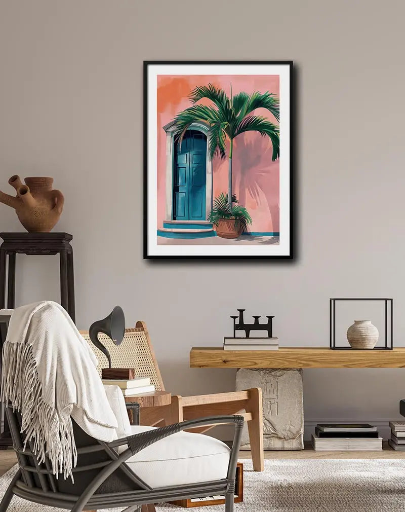 Tropical scene featuring a blue door with a potted palm against a pink wall, ideal for vibrant and coastal-inspired decor