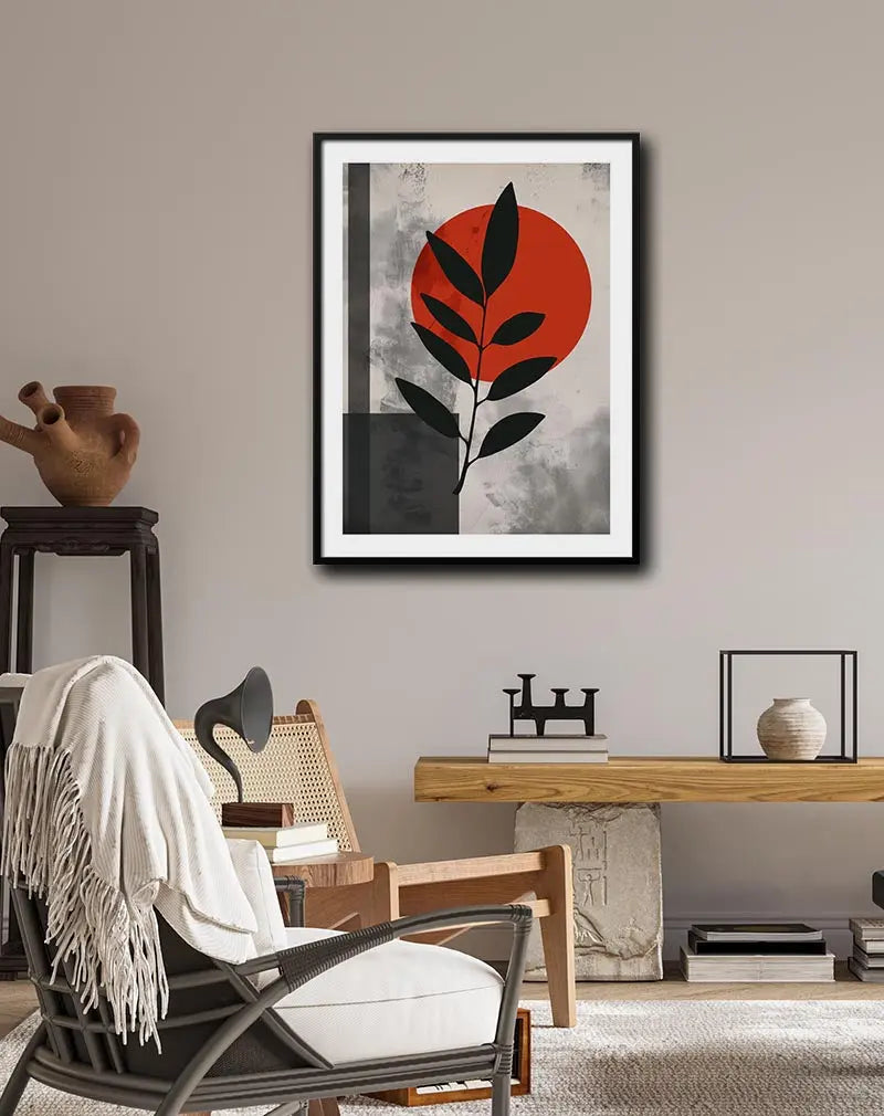 Abstract botanical artwork with a black leaf silhouette against a red circular background and textured gray tones