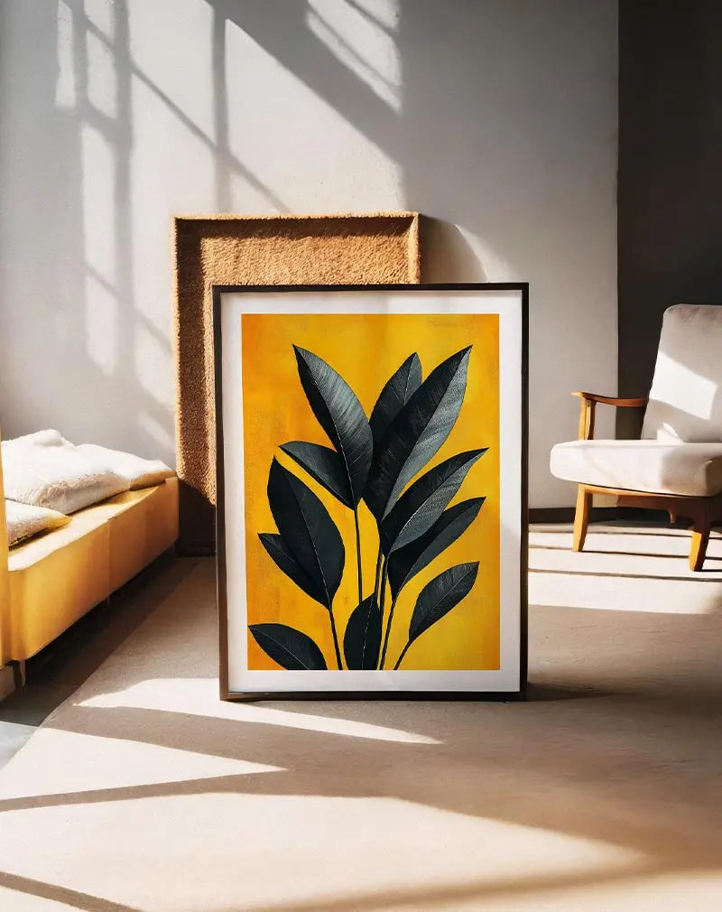 A striking botanical illustration of dark leaves set against a vibrant yellow background. The deep tones of the foliage contrast beautifully with the warm backdrop. Perfect wall art for bringing a bold natural element into modern or tropical-inspired interiors.