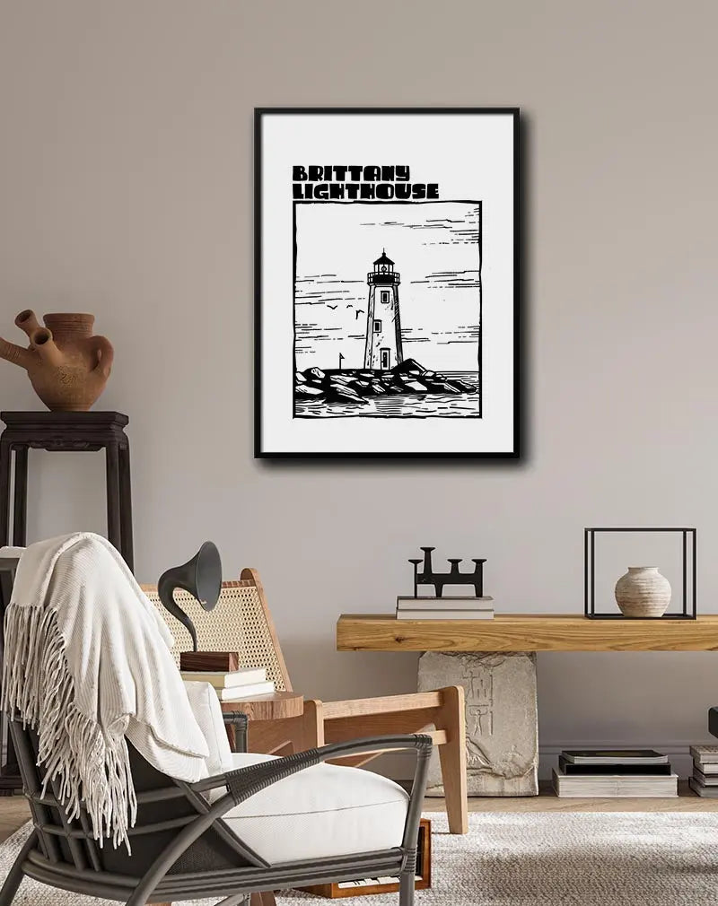 Black and white illustration of a lighthouse on the rocky shore of Brittany, France, with seagulls flying in the sky. Ideal for nautical-themed wall art or a decorative poster