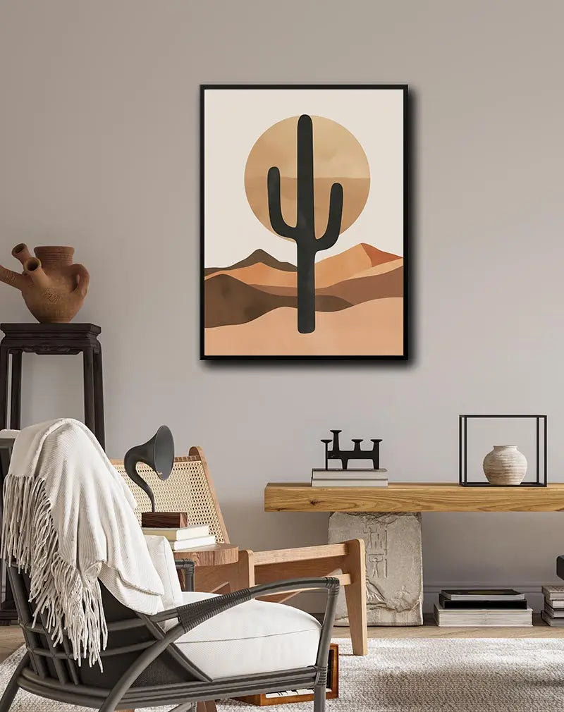 Minimalist illustration of a cactus in a desert landscape with a setting sun in the background. A perfect desert-themed wall art poster or nature-inspired illustration for home decor