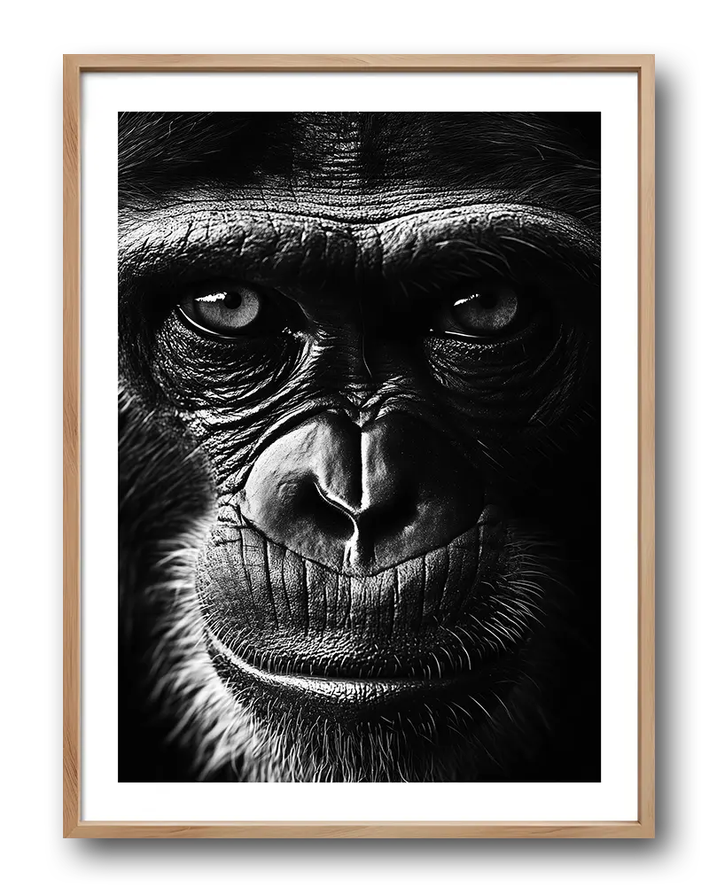 A striking black and white close-up portrait of a chimpanzee, emphasizing its deep expression and intricate skin details.