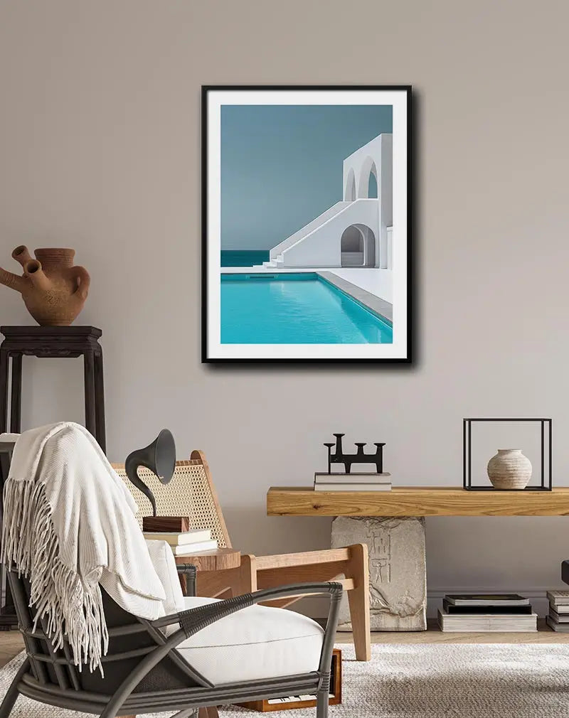 A minimalistic wall art poster featuring modern white architecture by a clear blue pool, overlooking the sea. This sleek illustration captures the essence of Mediterranean luxury and tranquility, perfect for enhancing contemporary home decor