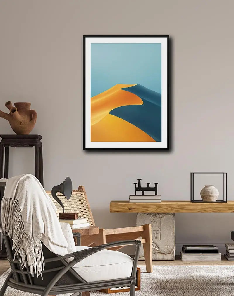 A minimalist art of golden sand dunes against a clear blue sky. Perfect wall art for adding a touch of tranquility to your space