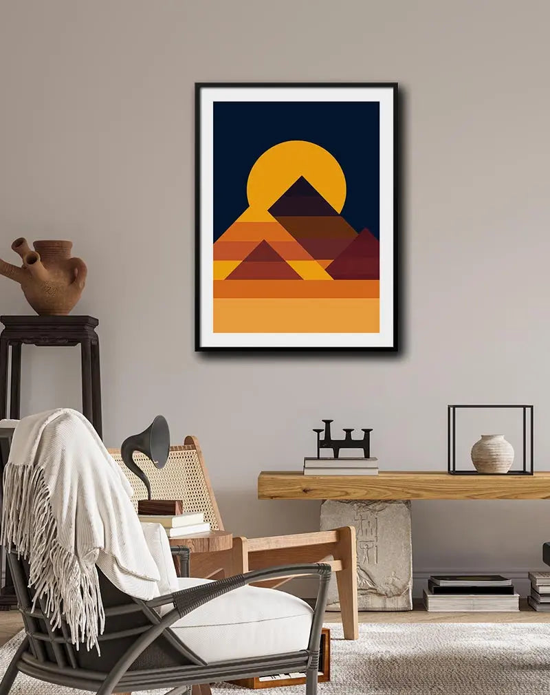 A minimalist geometric illustration of pyramids at sunset, with bold orange and dark tones. Perfect wall art to add a touch of warmth and abstract design to any space