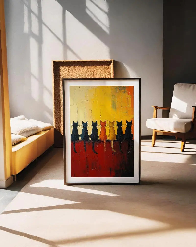 An artistic illustration of seven silhouetted cats sitting on a wall, set against a gradient sunset background in warm yellow and orange tones.