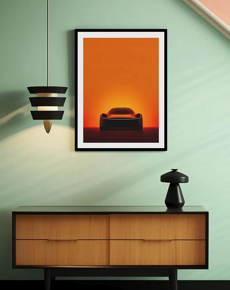 A sleek silhouette of a futuristic car against a vibrant orange sunset. Perfect wall art for auto enthusiasts or modern decor lovers, bringing a dynamic and stylish energy to any space