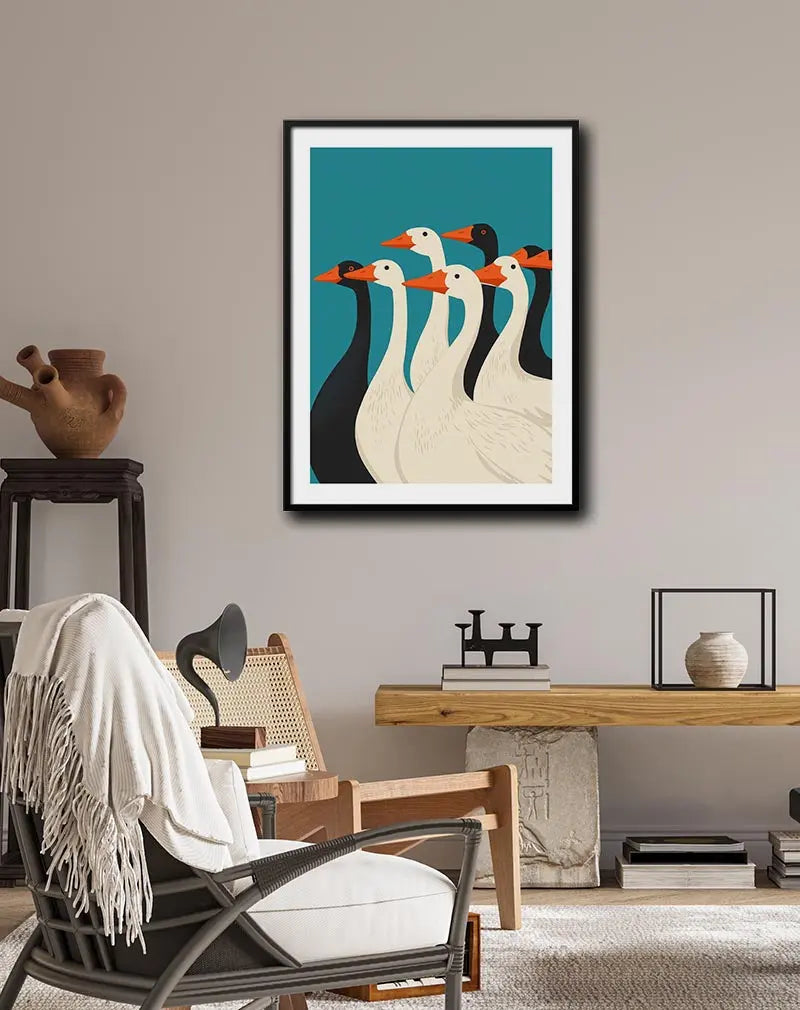 A minimalist illustration of a group of geese, featuring both white and black geese against a teal background. This modern wall art is perfect for creating a bold and stylish statement in any living room or hallway