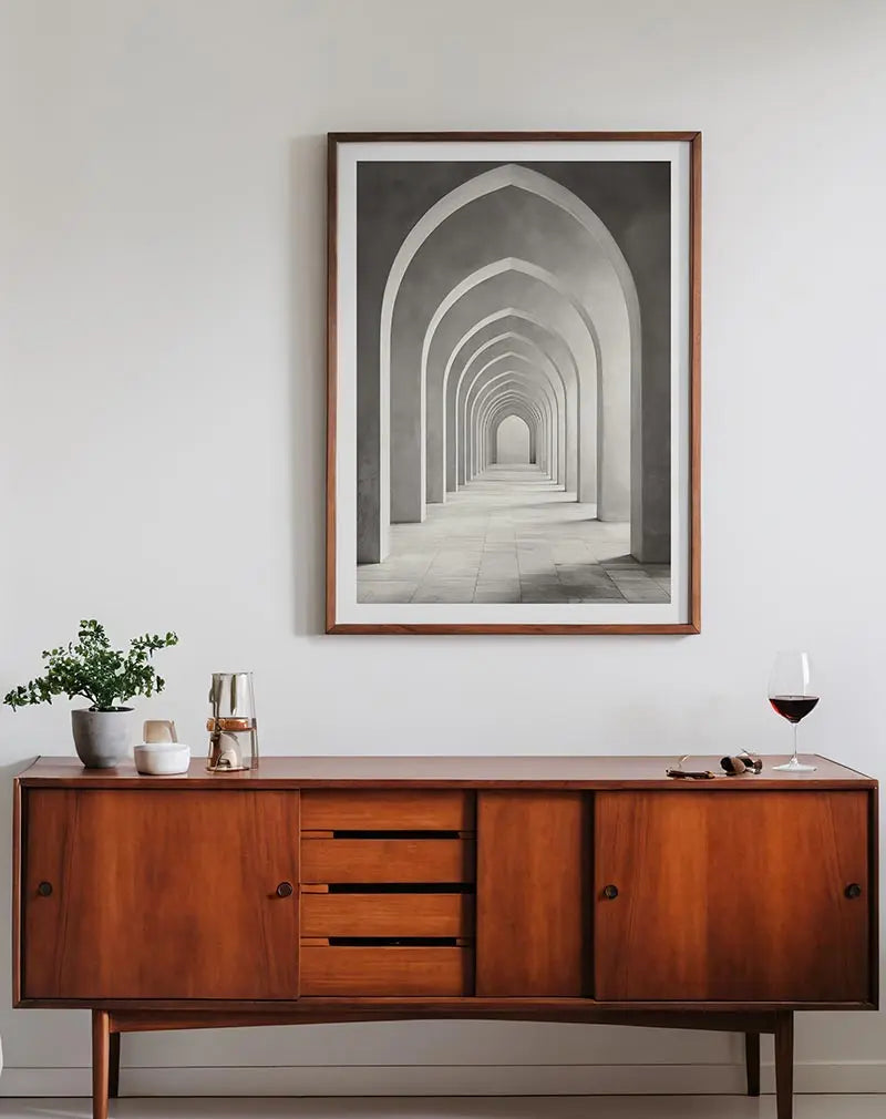 A mesmerizing architectural illustration of infinite arches in soft, neutral tones. This modern wall art creates a sense of endless depth and symmetry, perfect for contemporary interiors seeking a minimalist touch with a timeless feel