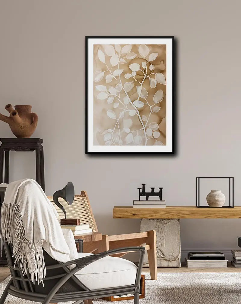 A minimalist illustration of white leaves on a beige background. This elegant botanical wall art brings a sense of calm and simplicity, perfect for creating a peaceful ambiance in any living space