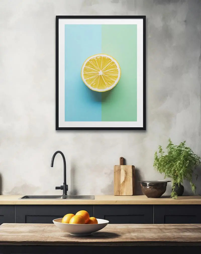 A minimalist yellow lemon slice illustration with a split blue and green background. Perfect wall art for a modern and fresh kitchen