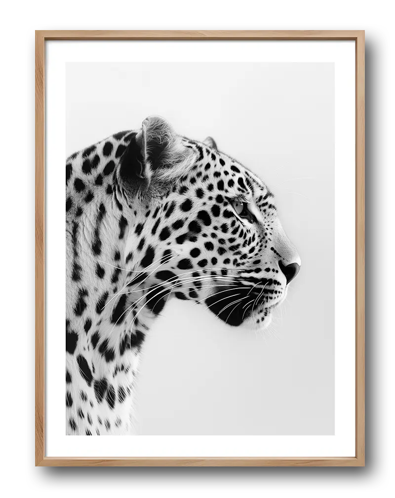 A detailed black and white illustration of a leopard in profile. Perfect wall art for adding a touch of elegance and nature to your interior. A timeless piece for animal lovers and modern spaces