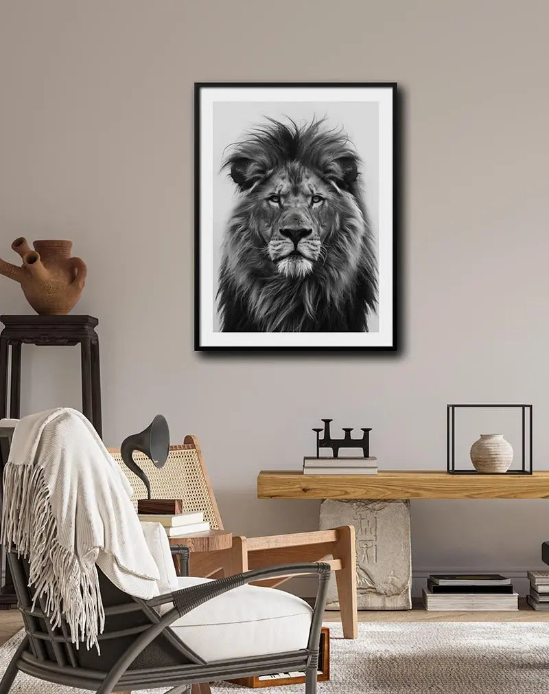 A majestic black and white illustration of a lion's face. Perfect wall art for a powerful and timeless addition to any space. Ideal for creating a bold, nature-inspired atmosphere