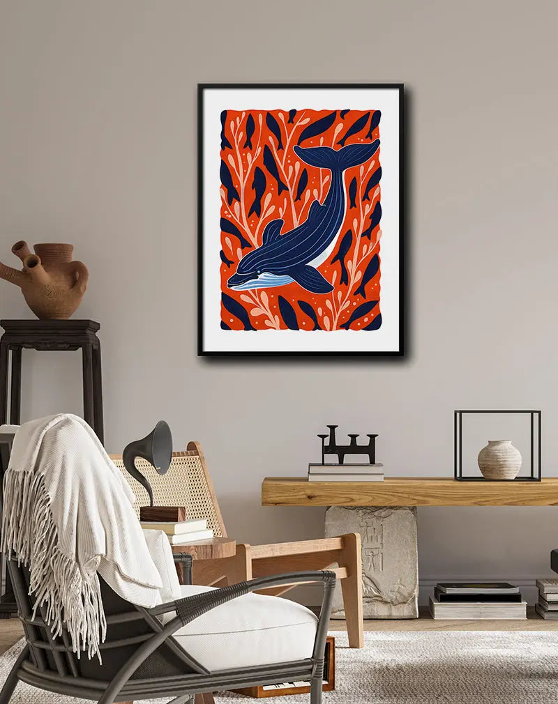 A vibrant whale illustration swimming in a sea of red and navy, surrounded by abstract seaweed and fish. Perfect wall art for adding a bold, marine-inspired touch to any room