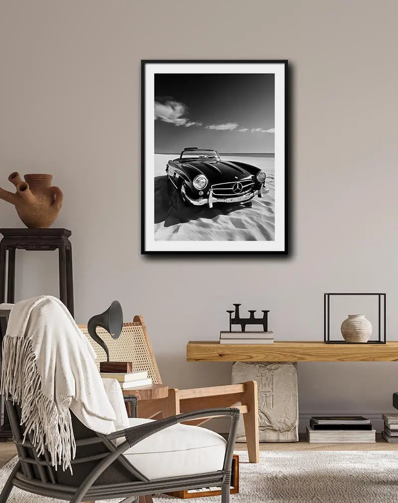 A striking black and white illustration of a classic Mercedes convertible on a sandy beach. Perfect wall art for adding a vintage, timeless touch to any space