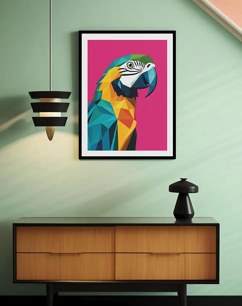 A vibrant geometric illustration of a parrot in shades of blue, green, and yellow on a bold pink background. This striking wall art brings a splash of color and energy to any room. Perfect poster for a contemporary and lively decor