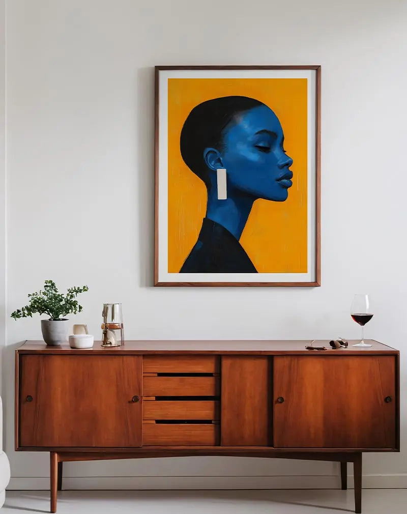 Vivid portrait illustration of a blue-toned profile against an orange background. A striking wall art piece to add bold color and style to any room.