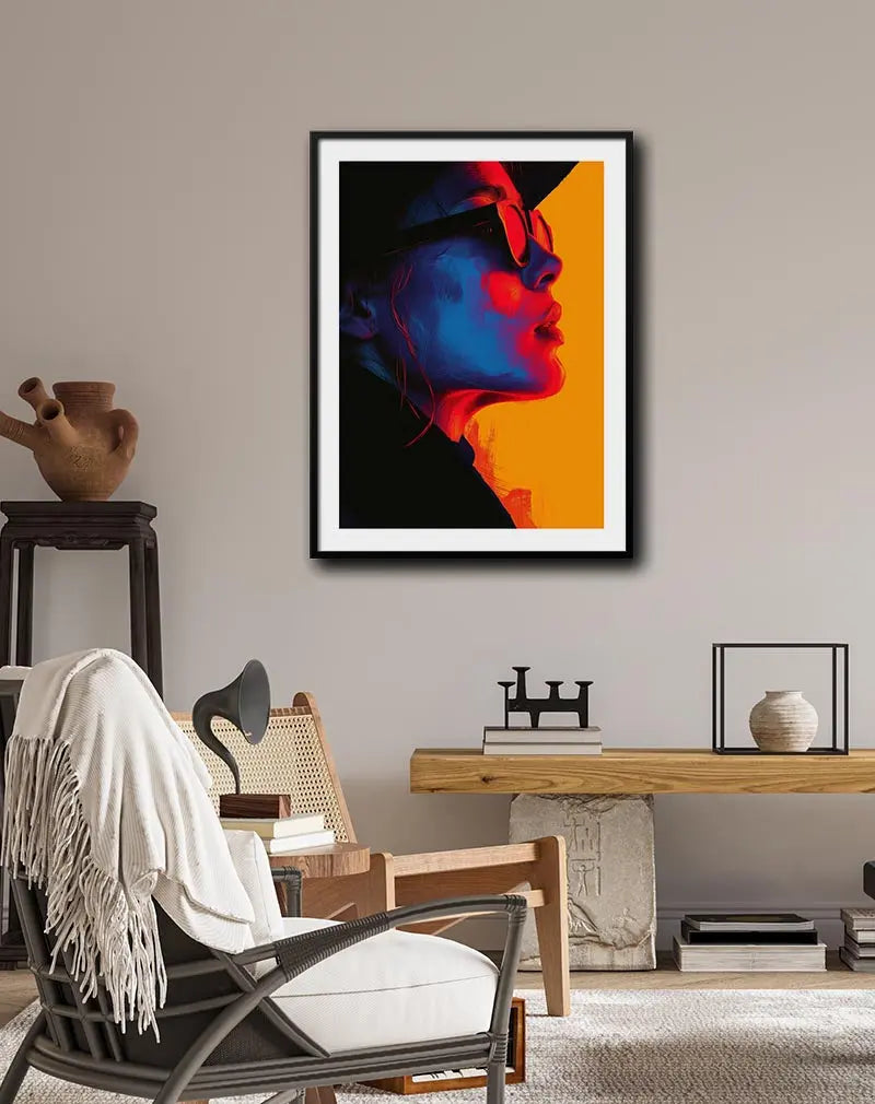 A striking abstract portrait of a person wearing sunglasses, with bold red, blue, and orange tones creating a captivating contrast. Perfect wall art for modern and creative spaces, adding a vibrant and edgy atmosphere