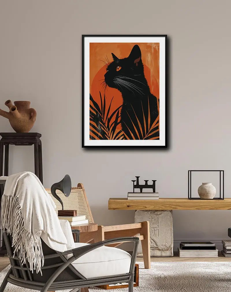 A striking illustration of a black cat silhouetted against a bold orange background with tropical leaves. The contrast between the dark cat and vibrant orange gives this wall art a mysterious and exotic feel. Perfect poster for adding a touch of elegance and intrigue to any space