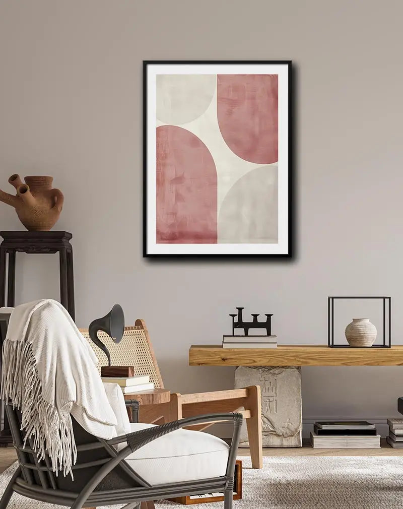 A minimalist geometric design featuring soft pink and cream abstract shapes. Perfect wall art for adding a subtle, modern touch to any living room or bedroom decor with its calm and muted tones