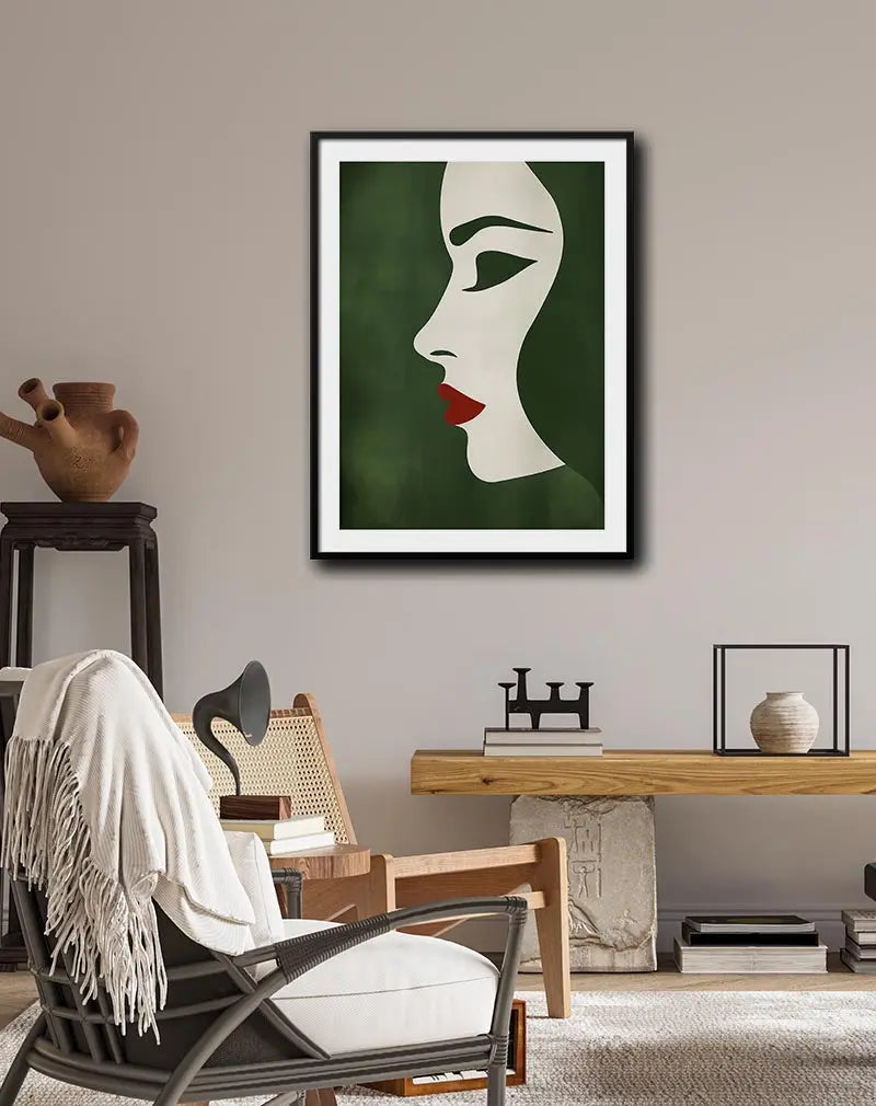 A minimalist illustration of a woman's profile in bold green and red hues. Perfect wall art for adding elegance and a modern touch to any room, ideal for fashion-forward or contemporary decor