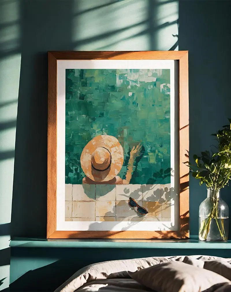 A serene illustration of a woman relaxing in a pool, seen from above, with a wide-brimmed sun hat. Her sunglasses rest on the poolside tiles, evoking a calm and laid-back atmosphere. Perfect wall art for creating a tranquil, summer vibe in any space, ideal for living rooms or patios