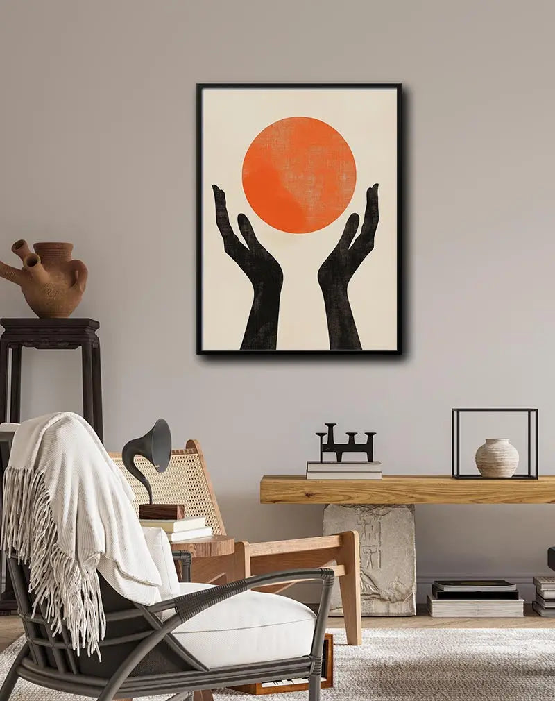 Abstract illustration of black hands holding a textured orange circle. Perfect wall art for adding a touch of minimalistic and modern design.