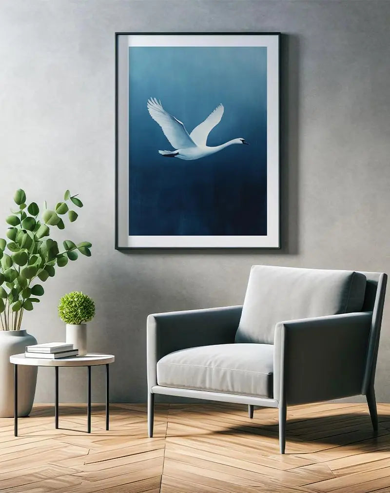 A graceful illustration of a white swan soaring through the air against a soft blue background. The elegant wings spread wide, capturing the beauty and freedom of flight. Perfect wall art for bringing a sense of calm and nature into any room, ideal for bedrooms or living spaces