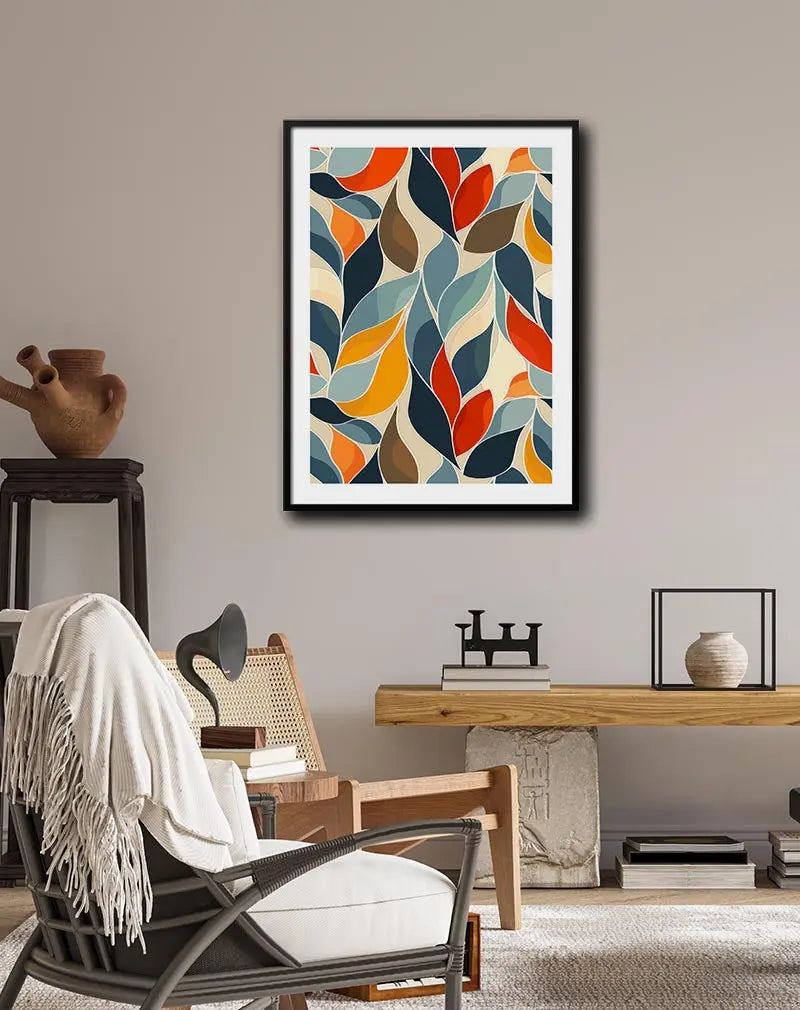 A vibrant abstract leaf pattern with bold colors of orange, blue, and yellow. Perfect wall art for adding a playful and modern vibe to your home decor