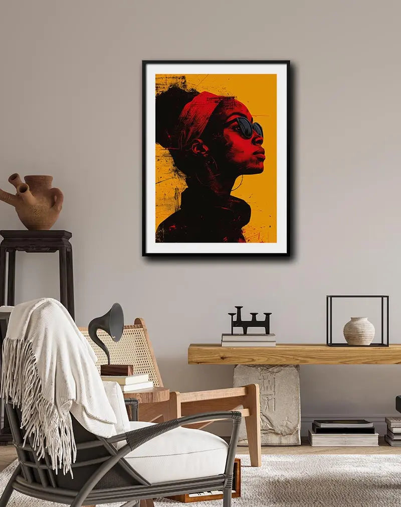 A striking portrait of a woman wearing sunglasses, with red and black tones against a vibrant orange background. Perfect wall art for adding a bold and confident vibe to any modern space